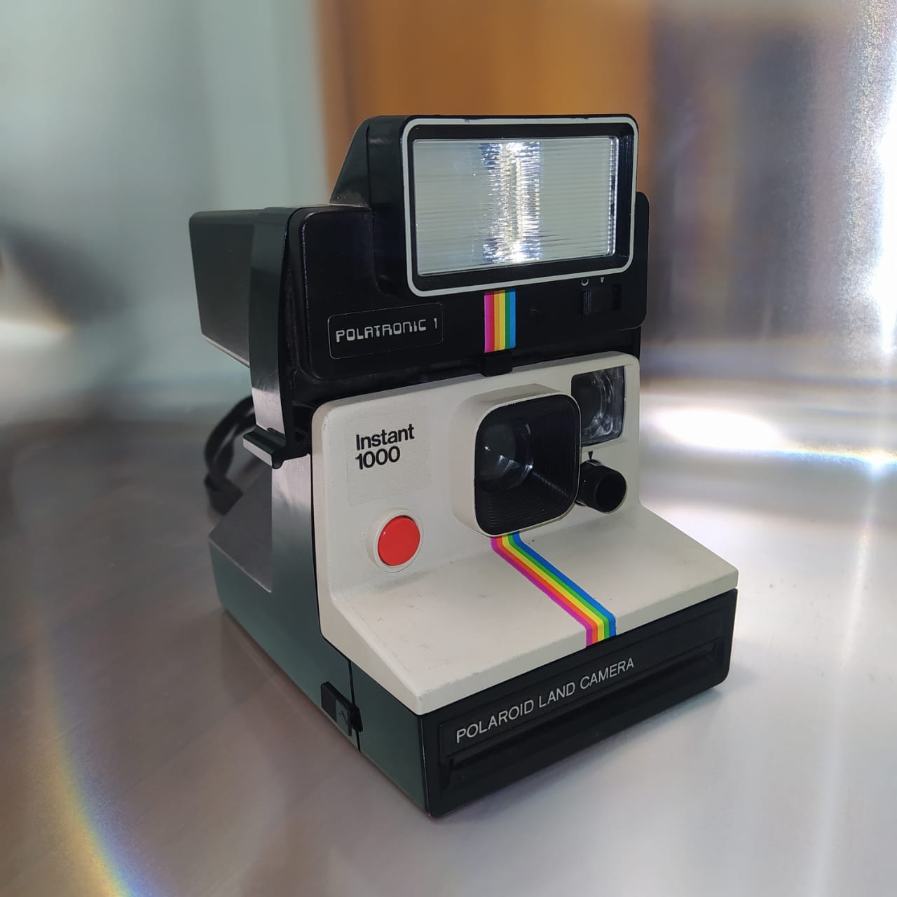Cámara instantánea Polaroid modelo 1000 con flash Polatronic 1